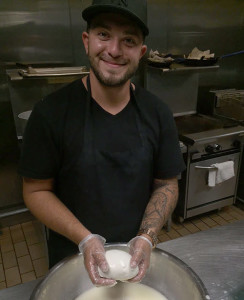 Eddie, owner, makes fresh mozzarella cheese Parrot coffee in Hollywood, fl